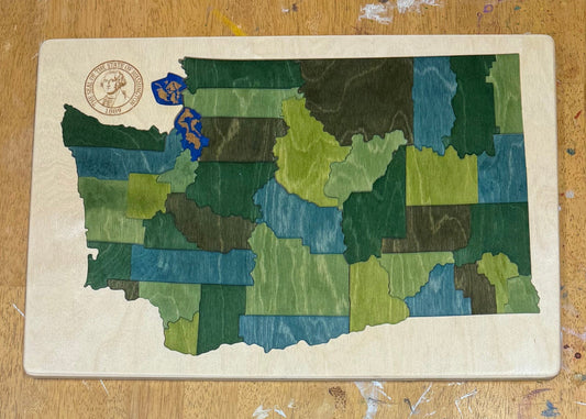Artistic wooden map of Washington state.